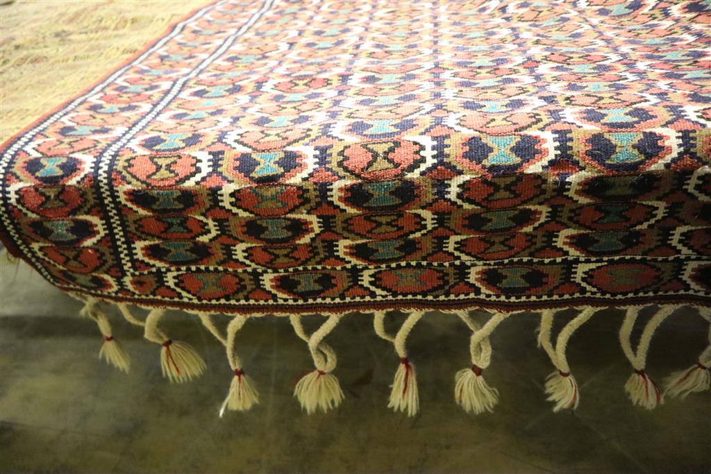 A Kelim geometric rug, 160 x 108cm, together with a smaller Persian prayer rug
